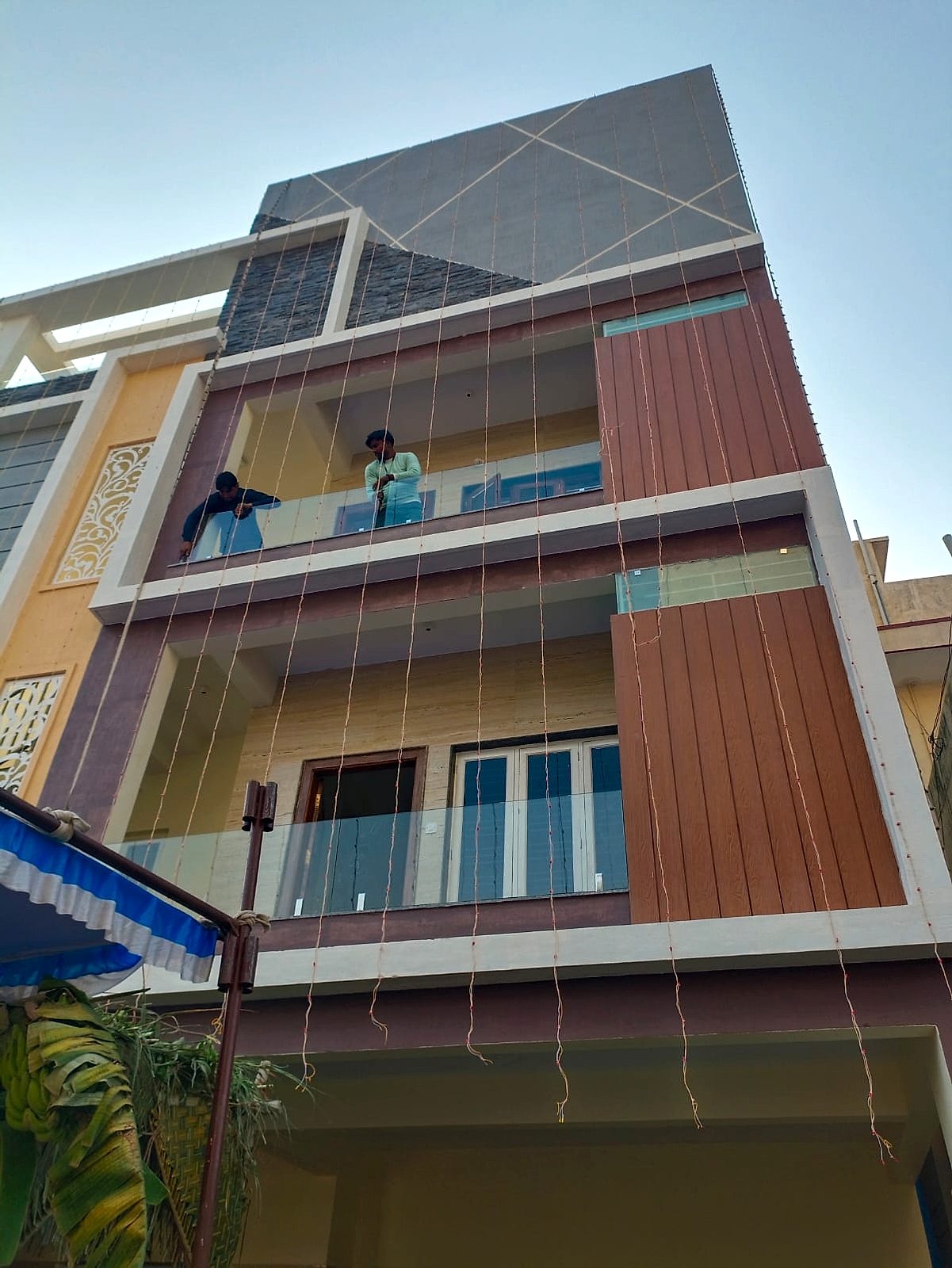 Balcony glass, wood cladding