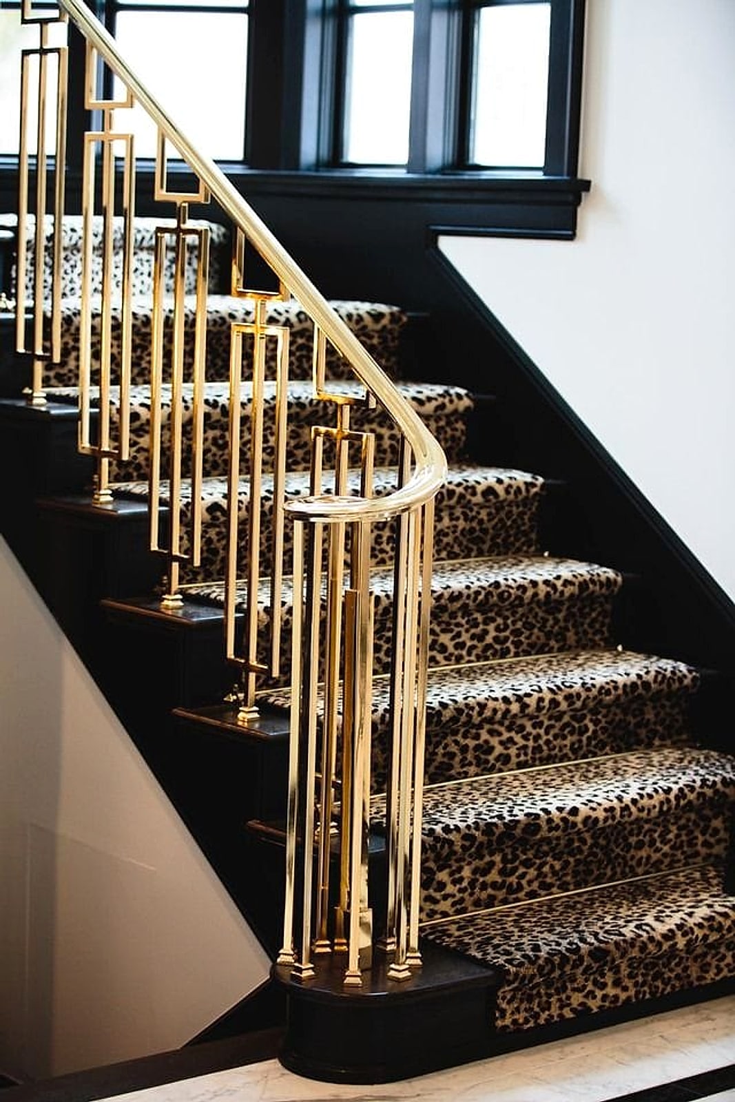 Gold geometric stair rail