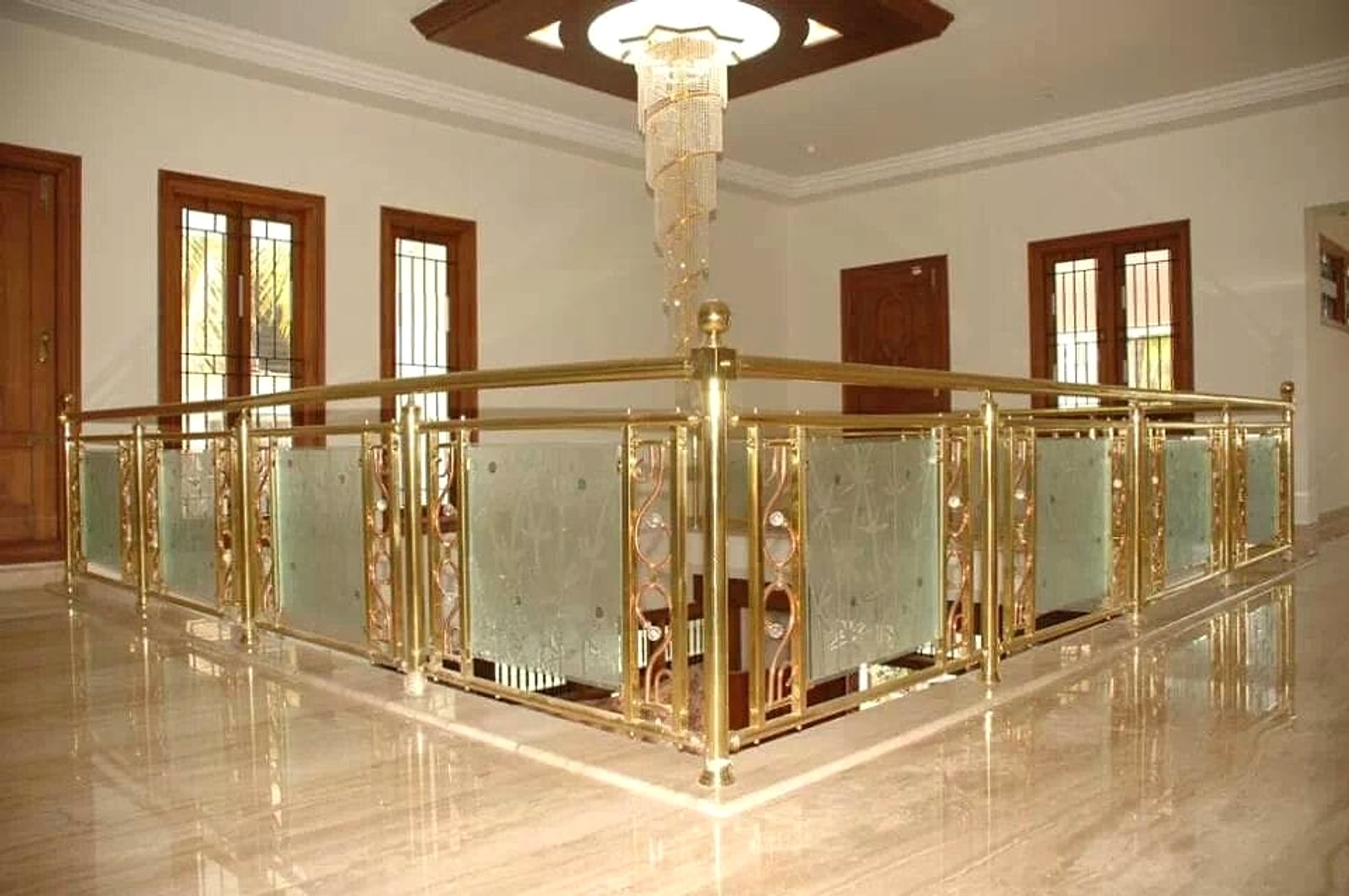 Gold and etched glass landing