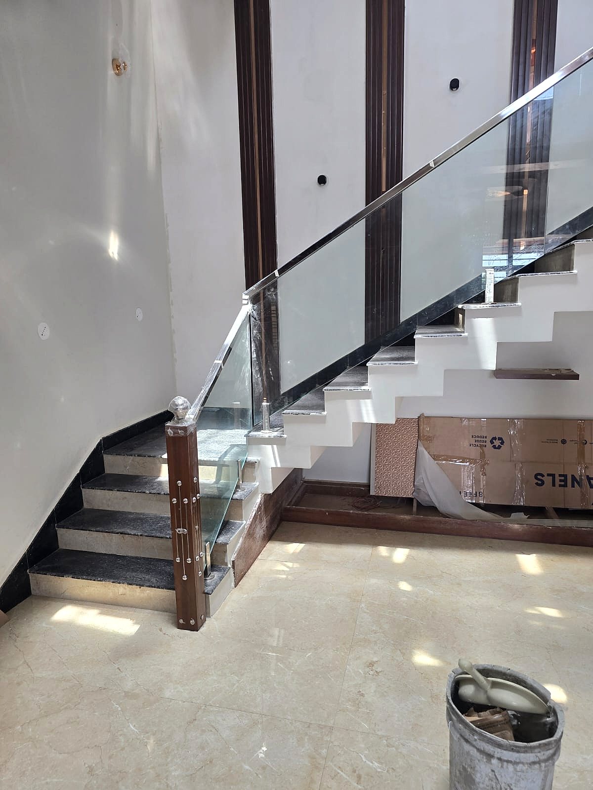 Glass with wood handrail