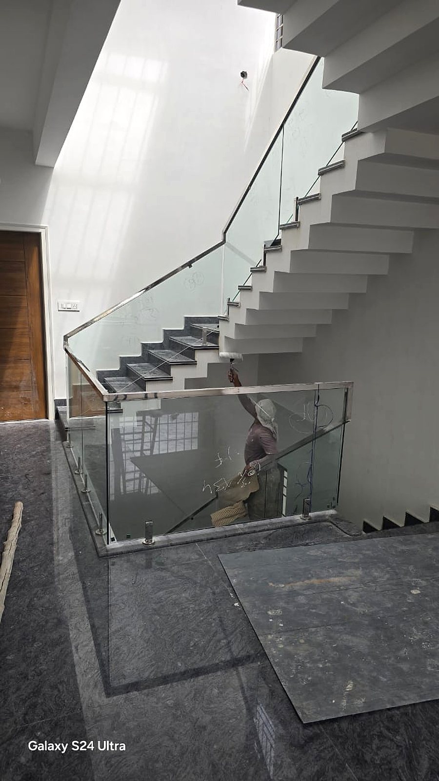 Glass and steel landing