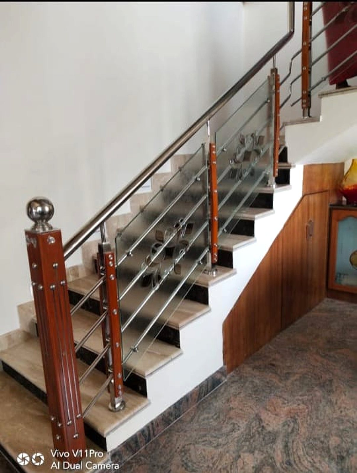 Wood newel, four-line stair